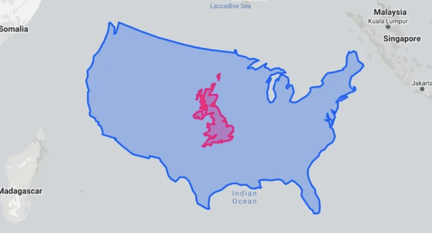 The land mass of the UK layered over the land mass of the USA